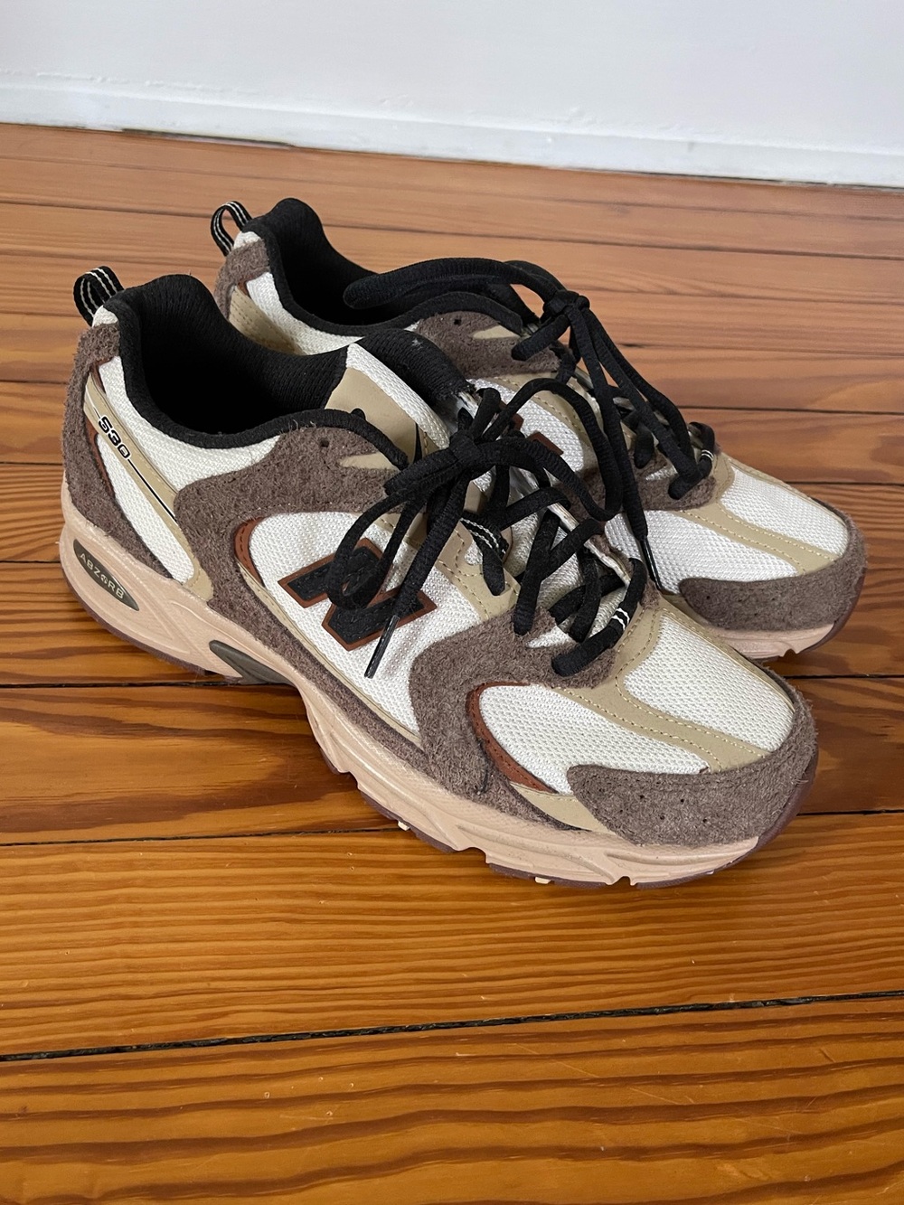 New Balance 530s in Dark Mushroom, Men’s 7, Women’s 8.5 NWOT